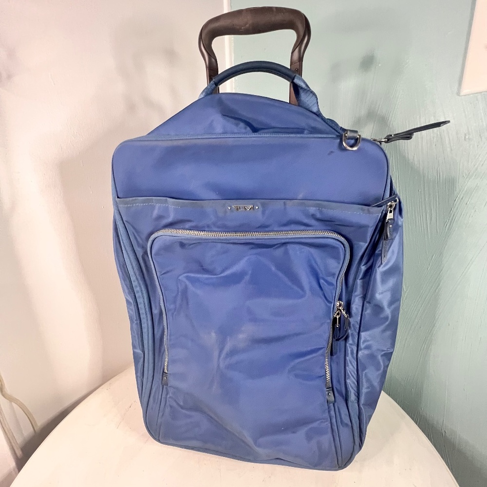 Tumi Nylon blue Super Leger 22 inch - 2 wheeled Carry-on luggage.